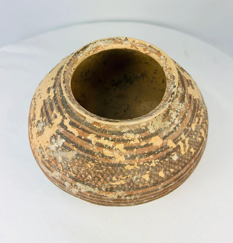 Close-up of Indus Valley ceramic jar showing painted geometric detail