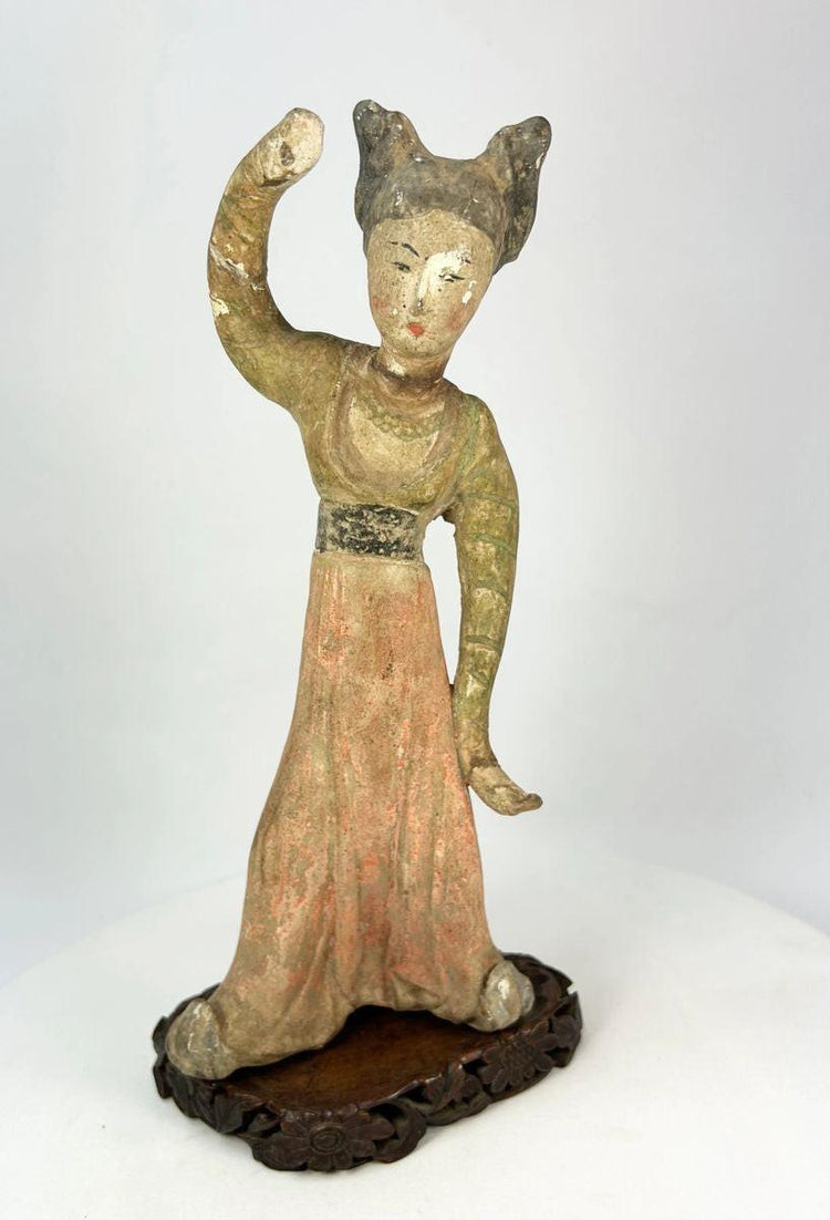 Ancient Chinese Tang Dynasty mingqi dancer figure in dynamic pose with flowing robes