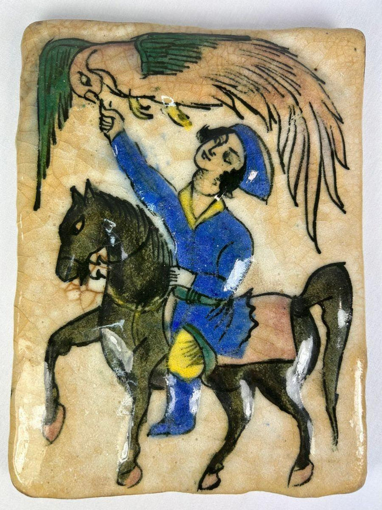 Front view of a Qajar period Persian tile with falconry scene