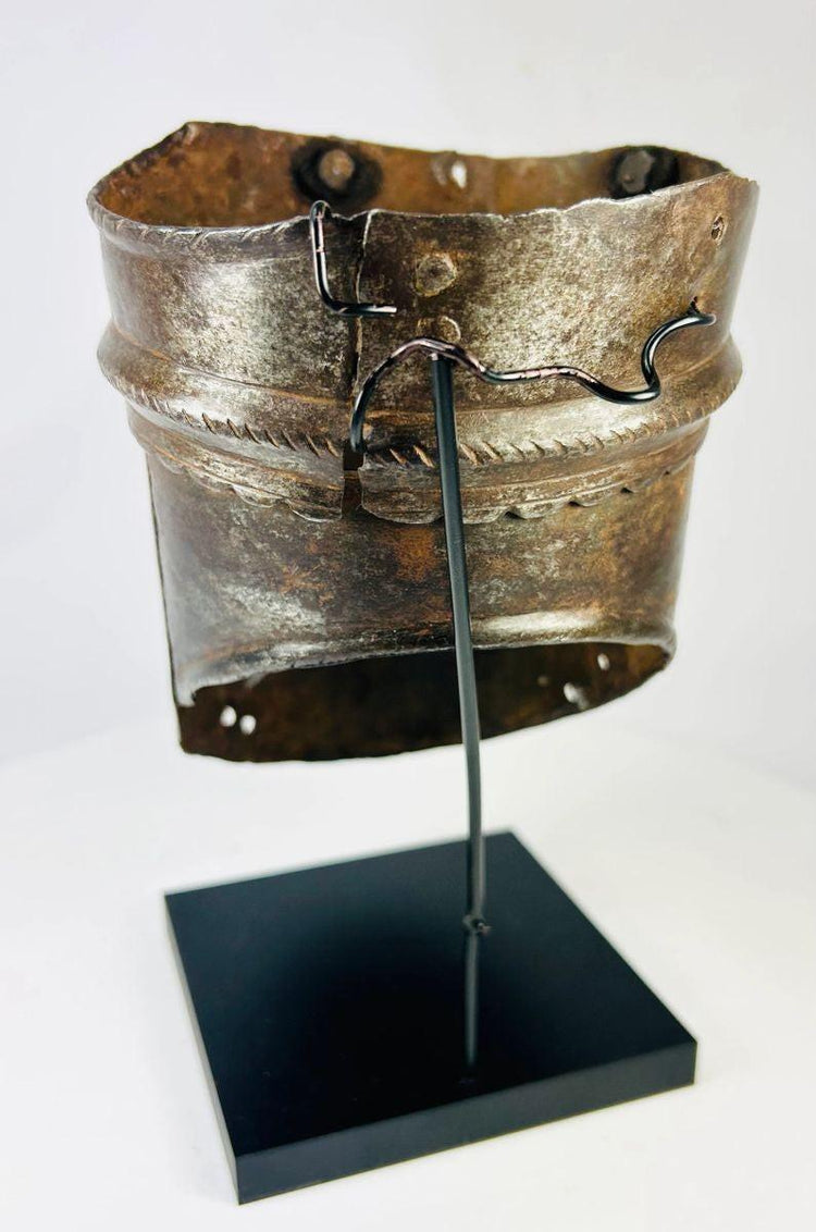 16th-century Renaissance forged steel upper arm defense with scalloped edges and incised decorative band, original patina intact.