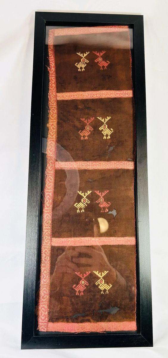 Pre-Columbian Andean textile showing intricate woven border patterns