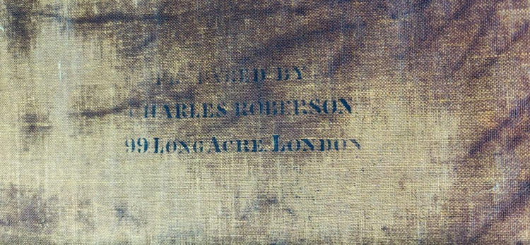 Charles Roberson supplier stamp on the canvas of “Happy Moments” by Edward John Cobbett R.B.A., 99 Long Acre, London, 19th-century British artist materials mark.