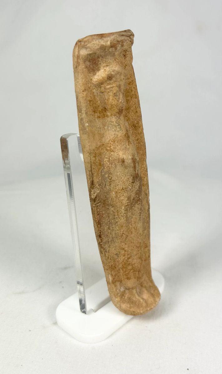 Angled view highlighting age-appropriate patina on an Ancient Roman fertility figurine