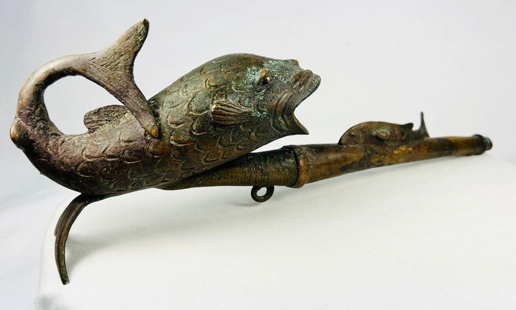 Early–mid 20th-century Cameroonian bronze pipe symbolic of fertility