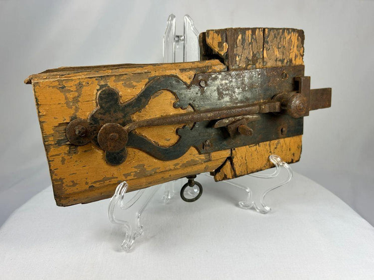 Historic colonial wooden lock showing traditional peg-joined construction