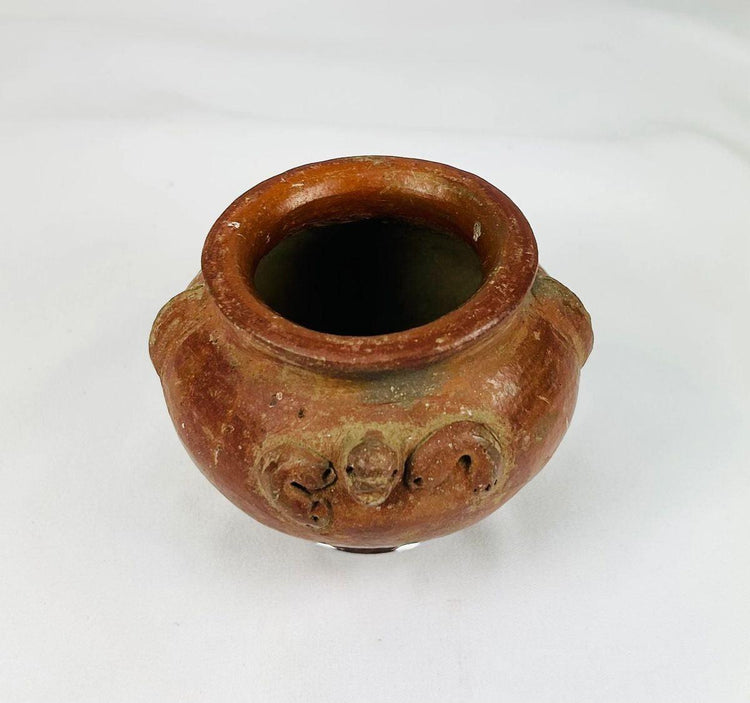 Late Pre-Columbian terracotta ritual vessel featuring molded decoration and sculptural form