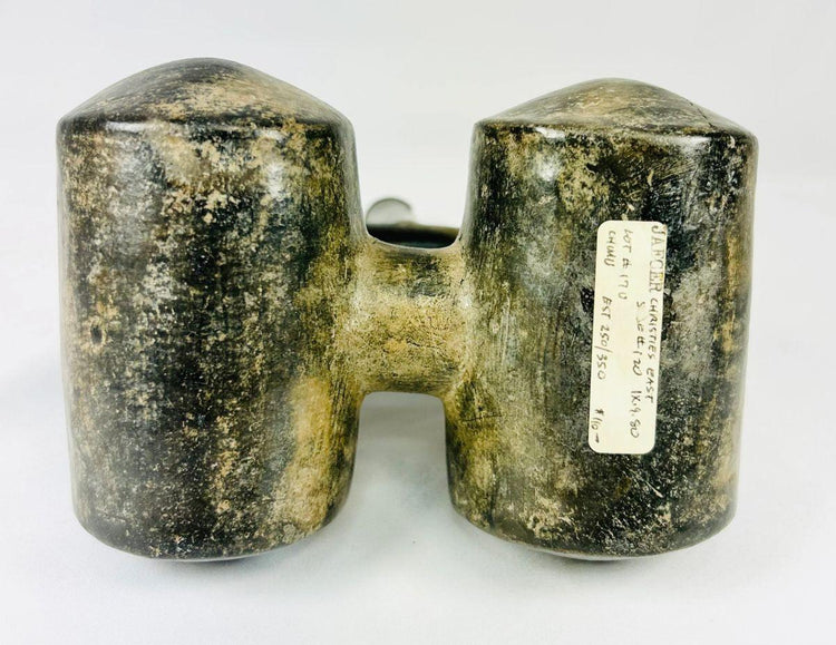 Ancient Chimu pottery vessel with sculpted spouts and smooth surface