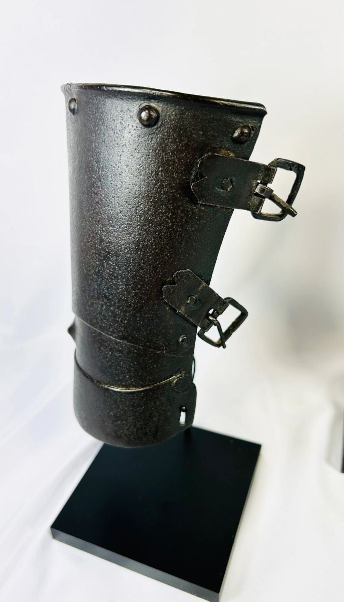 15th–16th century Continental armour vambrace, authentic medieval European forearm guard with original rivets and buckles on black display stand, Relic and Rarity.