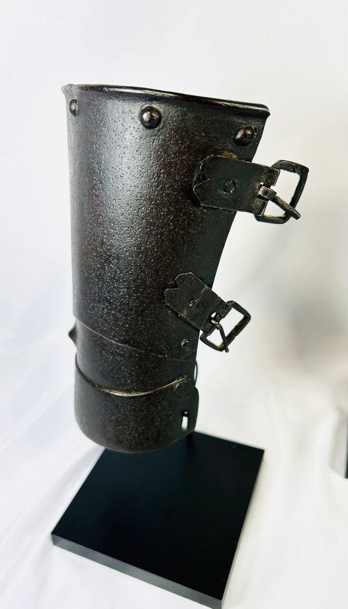 15th–16th century Continental armour vambrace, authentic medieval European forearm guard with original rivets and buckles on black display stand, Relic and Rarity.