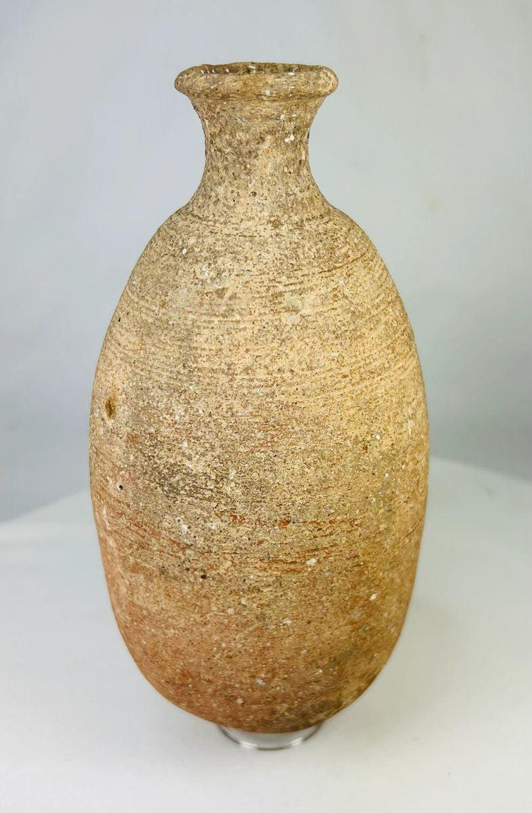 Front view of an ancient Greco-Roman terracotta amphora used for storage