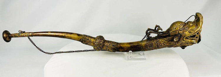 Antique Tibetan ritual trumpet with ornate dragon and scaled details