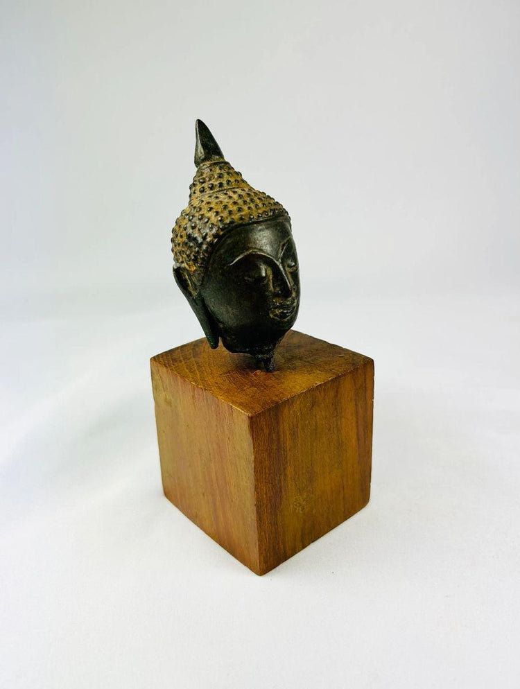 17th–18th century Thai bronze Buddha head with serene expression and natural aged patina