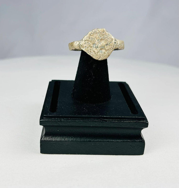 Sassanian bronze ring with detailed engraving and rich green patina