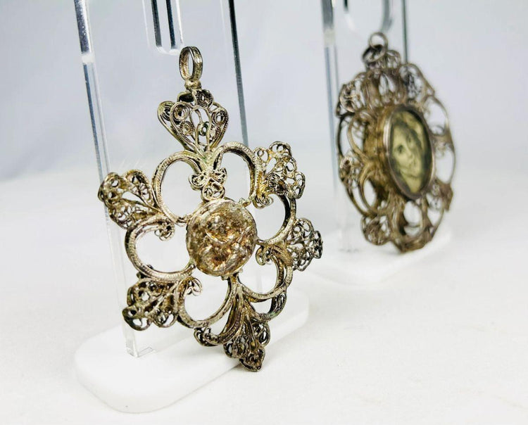 19th-century silver filigree Catholic pendant with engraved Christ image