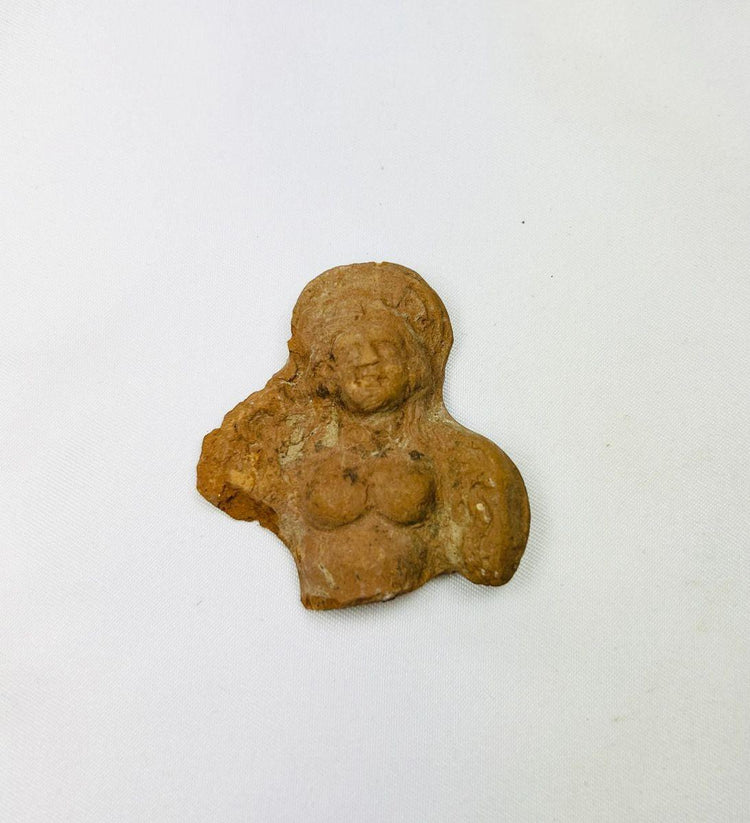 Ancient Egyptian terracotta female figurine fragment from the Ptolemaic Period, circa 200–100 BCE.