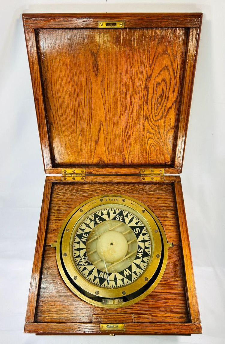 Authentic early 20th-century E.S. Ritchie nautical compass with provenance and original housing.
