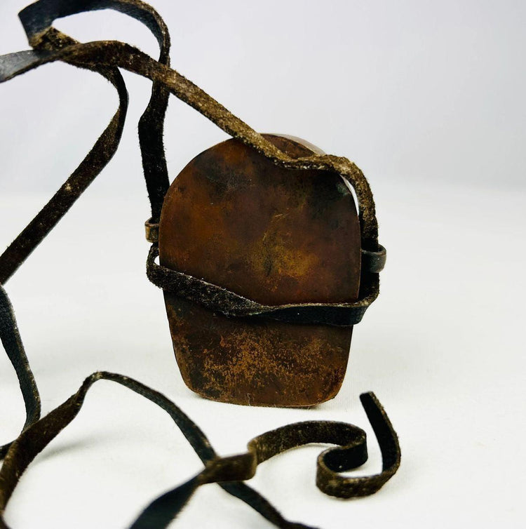 Detail of carved and cast front panel decoration on Tibetan Gau amulet box.