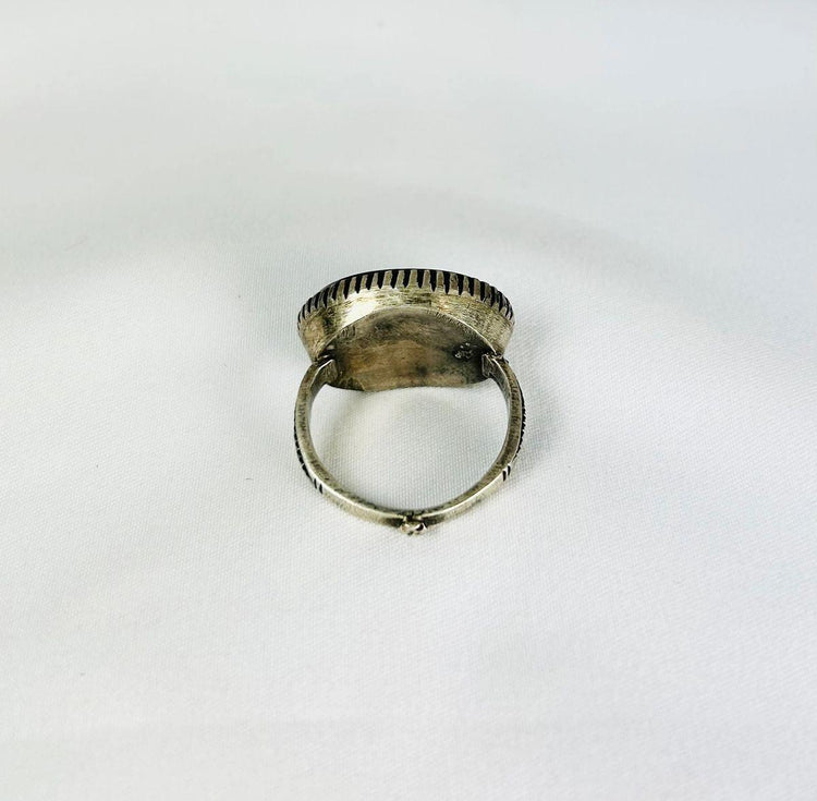 Antique Near Eastern carnelian intaglio ring, engraved motifs on red carnelian, silver mount, black display stand