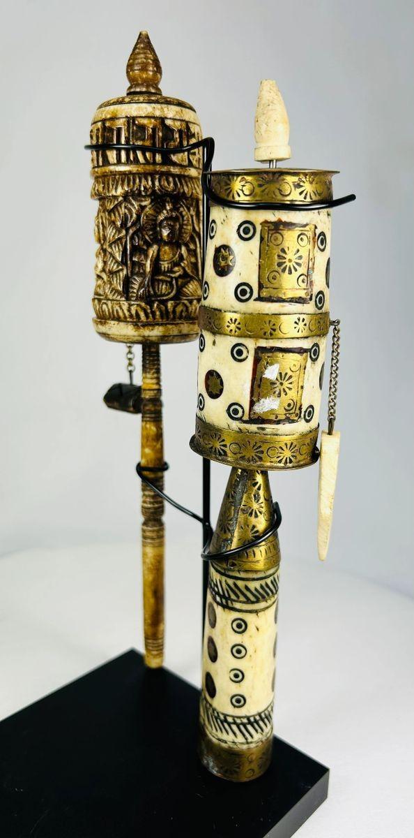Antique Tibetan hand-carved bone and brass prayer wheels on display stands