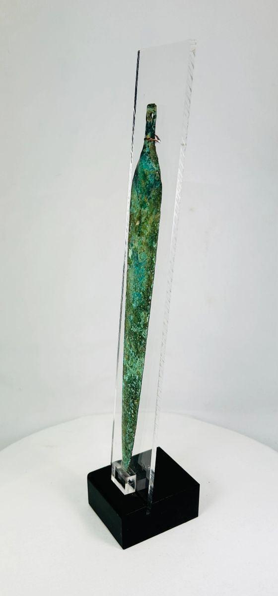 Side view of a Western Asiatic bronze dagger blade showing elongated profile