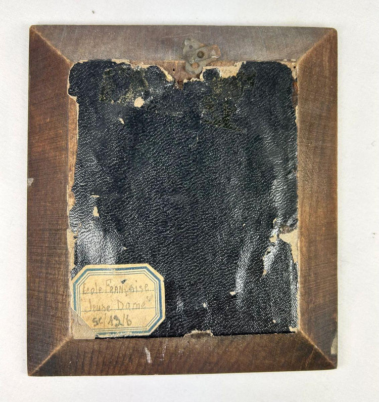 Reverse view of the ebonized frame and original backing of the miniature