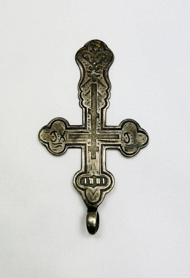 Russian Orthodox silver cross pendant, 18th century, classic cruciform with upper crossbar and Cyrillic inscriptions