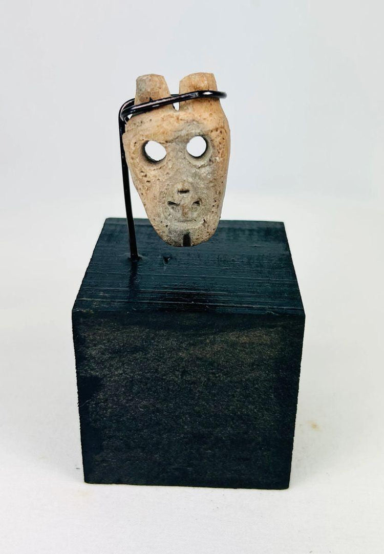 Ancient West Mexican carved bone mask pendant, Colima or Nayarit culture, circa 300 BCE–300 CE