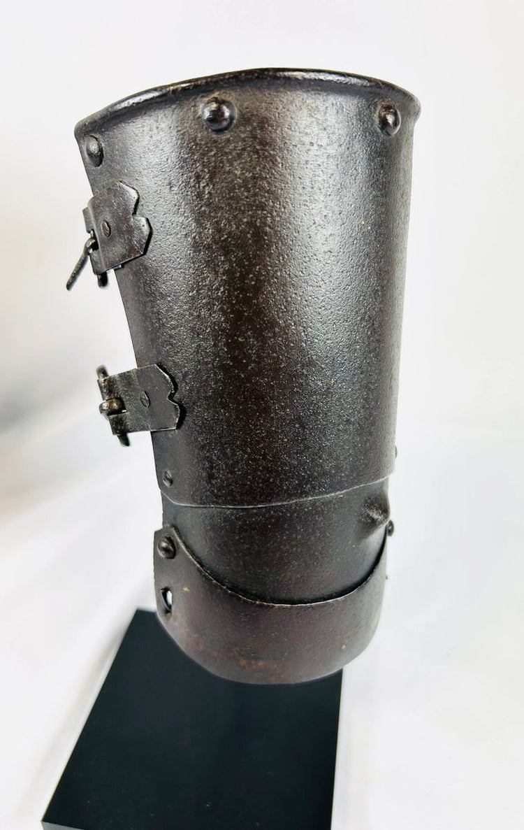 15th–16th century Continental armour vambrace, authentic medieval European forearm guard with original rivets and buckles on black display stand, Relic and Rarity.