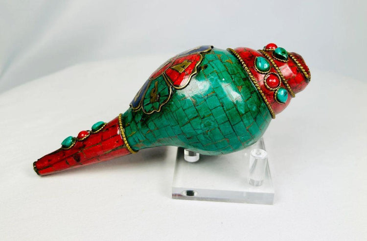 Antique Tibetan conch trumpet with gemstone inlays and ritual use