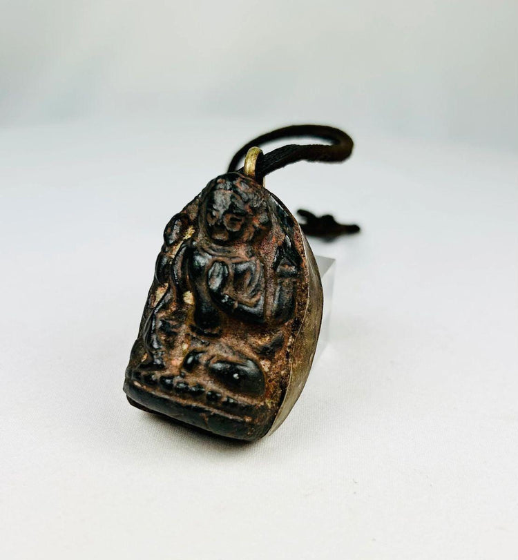 Bronze Buddha amulet pendant with sealed brass back and aged patina