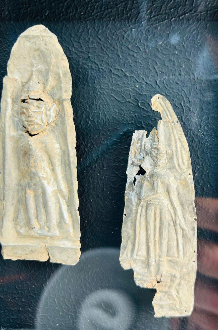 Antique cast metal plaques with Buddha and attendant figures in meditation