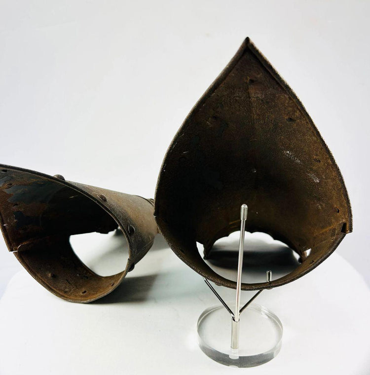 Top-down photo of Gothic armor gauntlets showing finger plate construction.