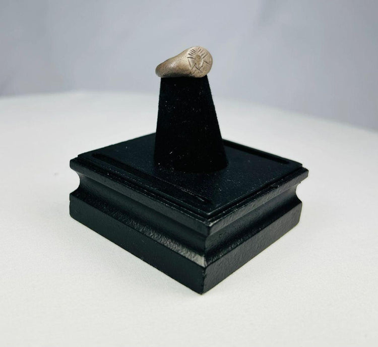 Ancient silver ring showcasing fine engraving and historical craftsmanship