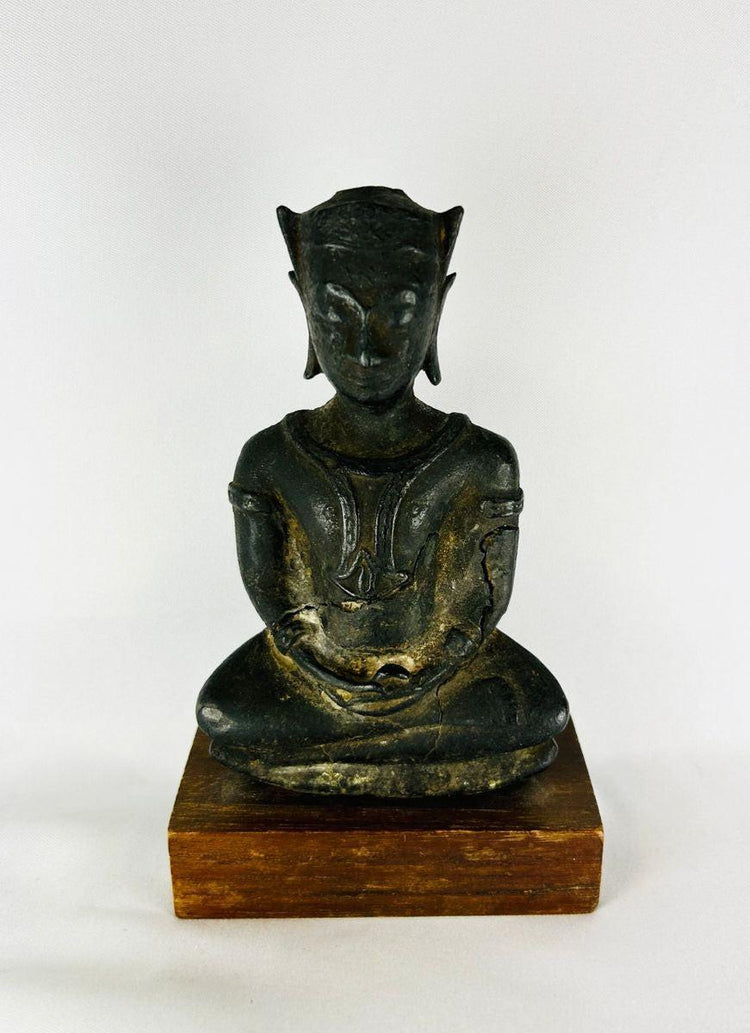 Antique bronze Buddha figure from Thailand or Burma with serene expression and aged patina