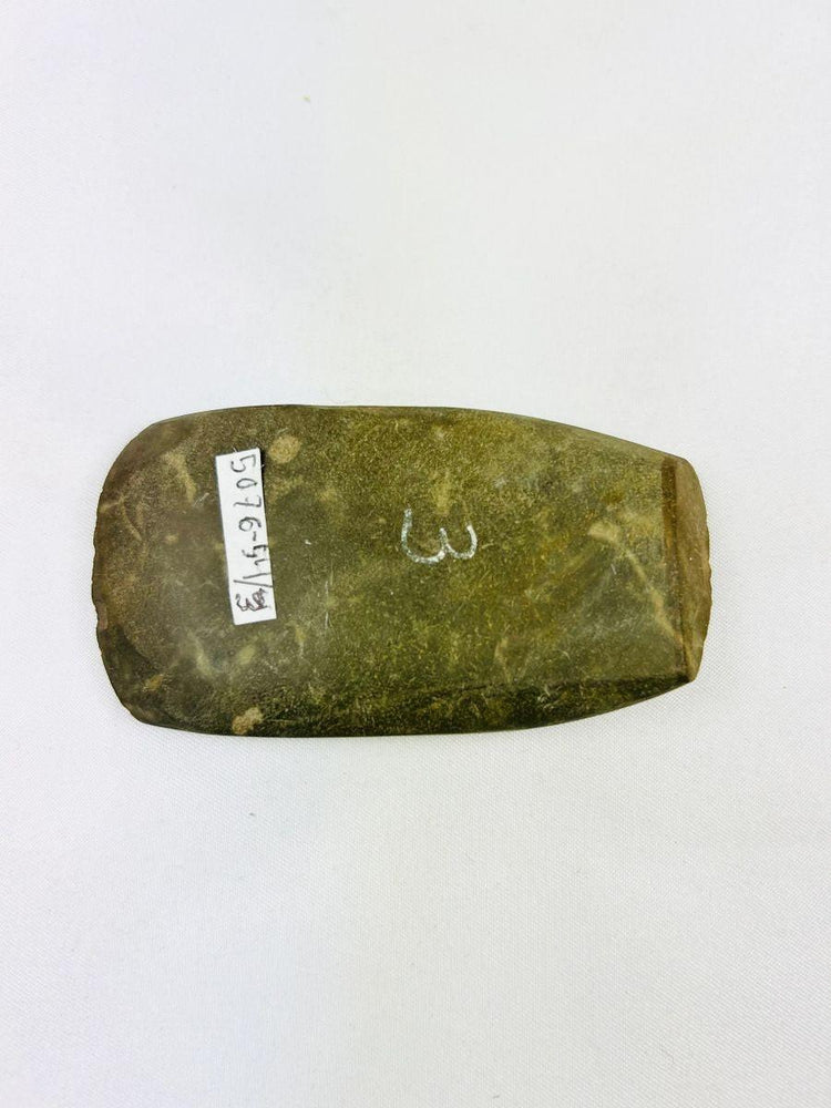 Ancient Andean utilitarian stone axe with fully ground faces and beveled edge