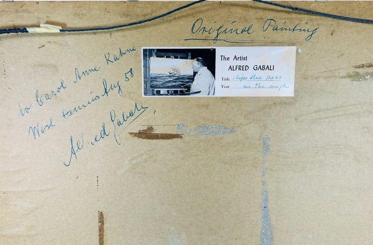 Close-up of verso inscription on Alfred Gabali painting with handwritten dedication ‘To Carol Anne Kahne – West Terris Bay 58,’ along with artist label identifying title ‘Ships That Pass in the Night’ and authentication details