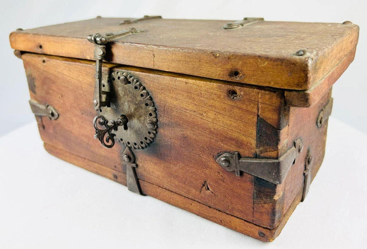 Antique elmwood lockbox with hand-forged iron fittings and original key, circa 1780–1820.