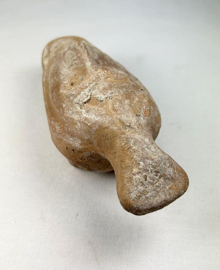 Historic Byzantine terracotta oil lamp with open mouth human face