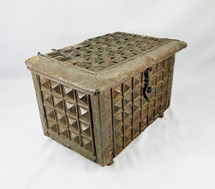 Decorative 19th-century Indian brass-clad lidded box with intricate patterns