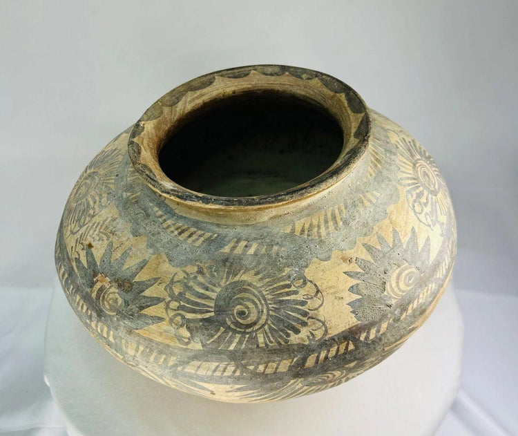 Prehistoric European Neolithic terracotta vessel with hand-painted spiral and sunburst motifs, bulbous body and narrow rim, circa 5500–4500 BCE, attributed to the Linear Pottery or Vinča culture