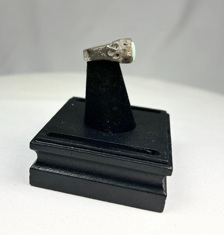 9th–7th century BCE Assyrian silver ring showcasing craftsmanship and spiritual symbolism