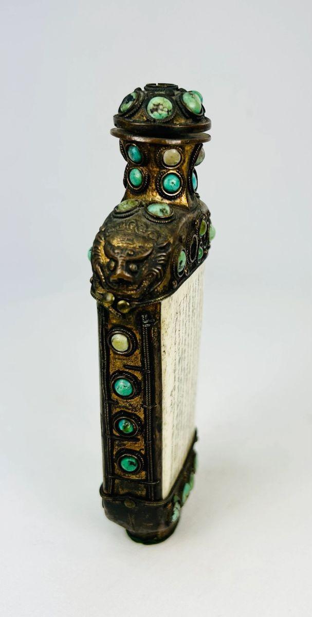 Bronze Sino-Tibetan Buddhist ritual container with Tibetan or Sanskrit inscriptions and protective lion mask reliefs