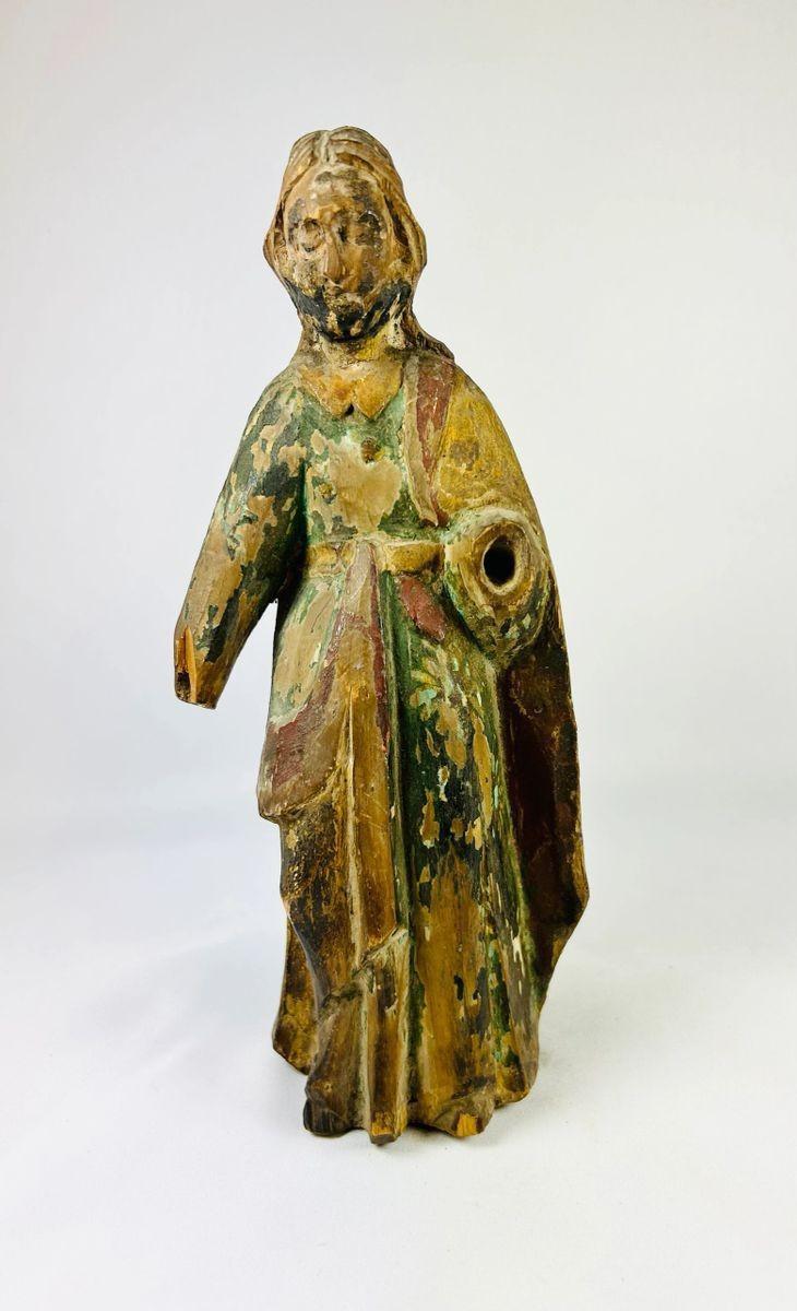 Antique religious wooden figure from Spanish Colonial Latin America, showing aged polychrome remnants and expressive carving