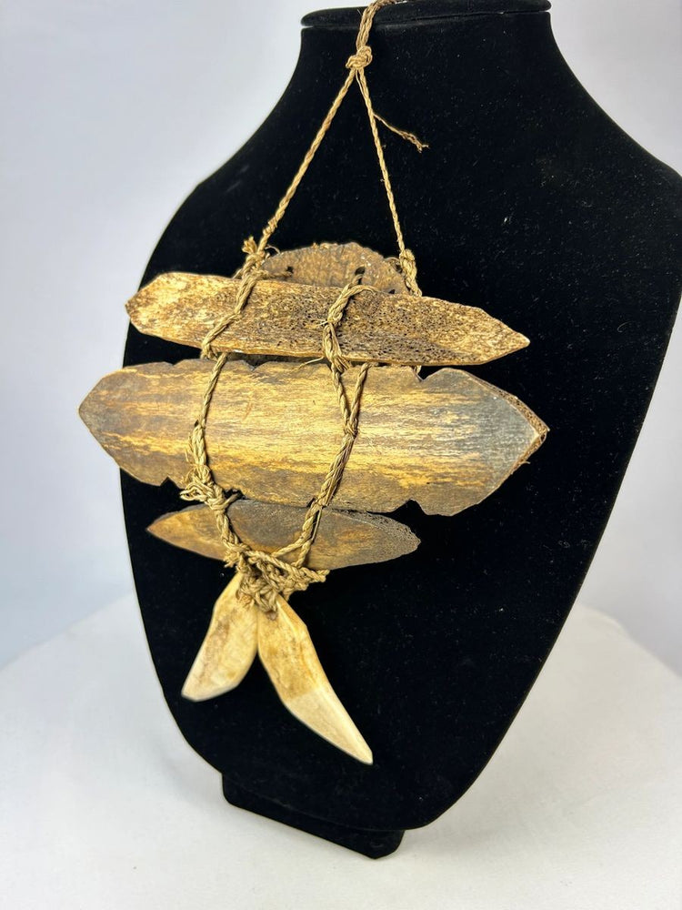 Mid-20th-century African pendant mask Lega tribe with wood backing