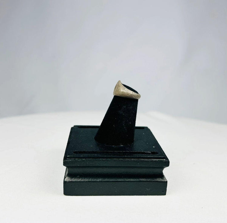 Early Byzantine silver signet ring with sunburst design and worn patina