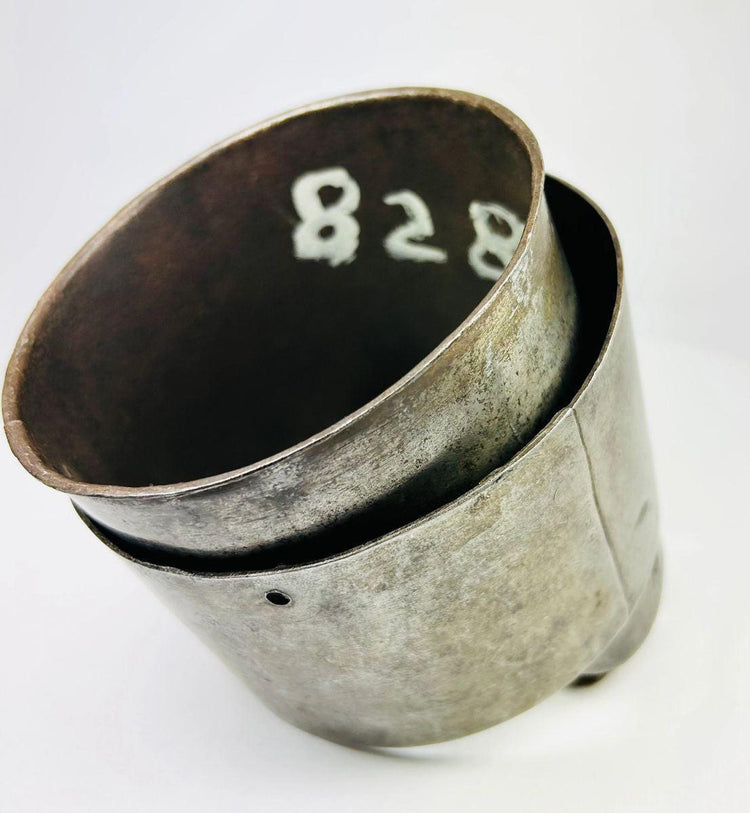 Antique steel upper arm cannon from a 17th century suit of siege armor with articulated rivets