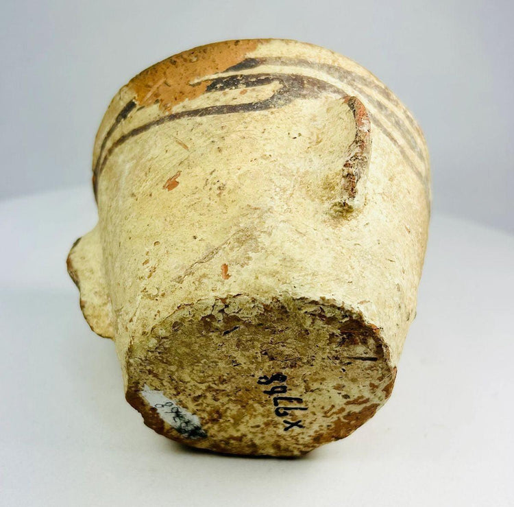 Museum-quality Islamic Afghan pottery mortar photographed against a neutral background