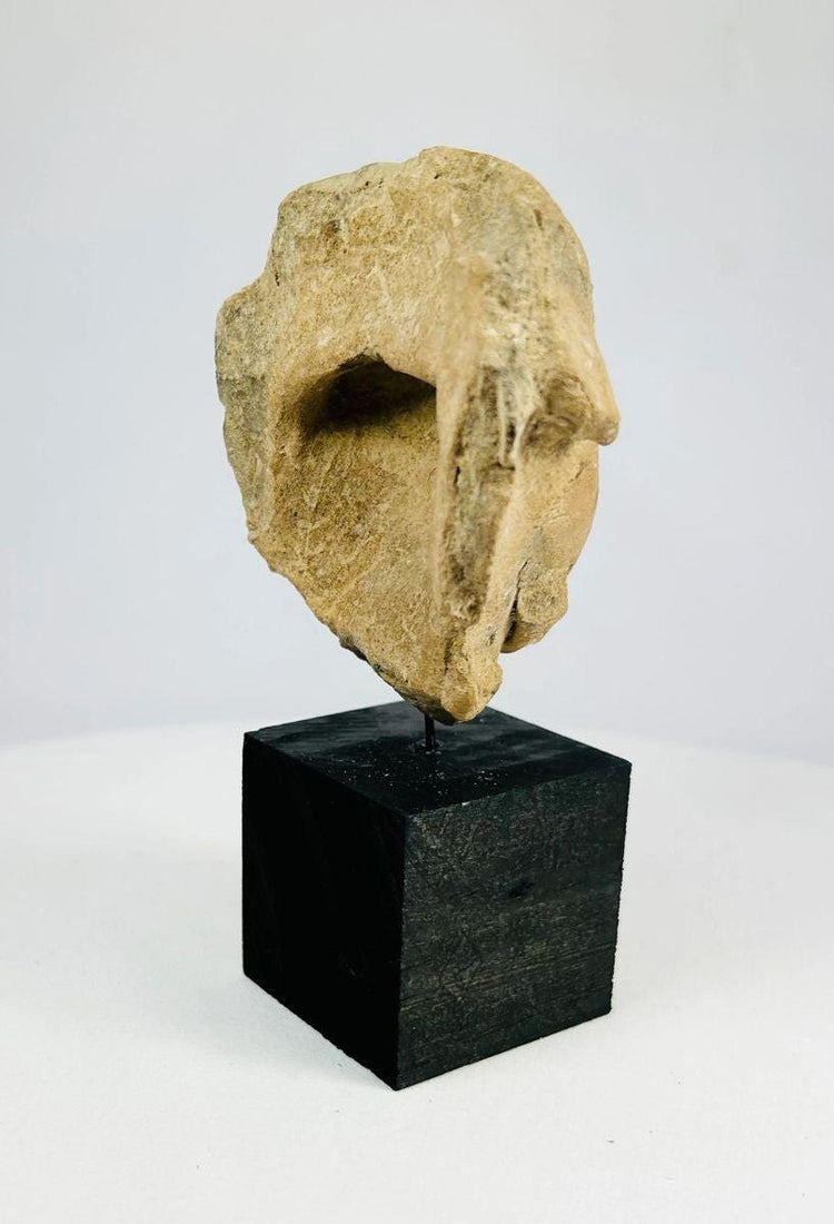 Ceramic head fragment from 500–900 CE featuring expressive facial details