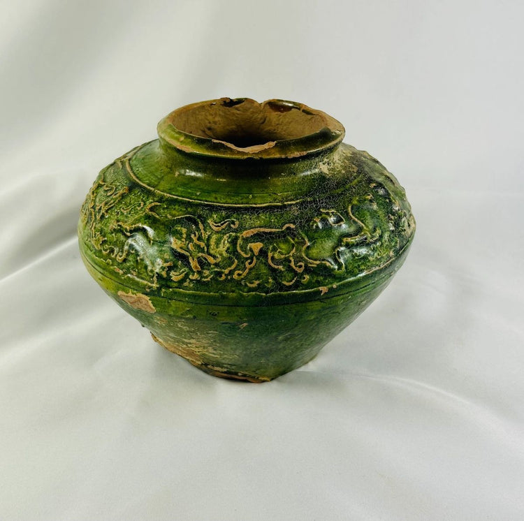 Full-body image of early imperial Chinese green-glazed ceramic jar, circa 206 BCE–220 CE.