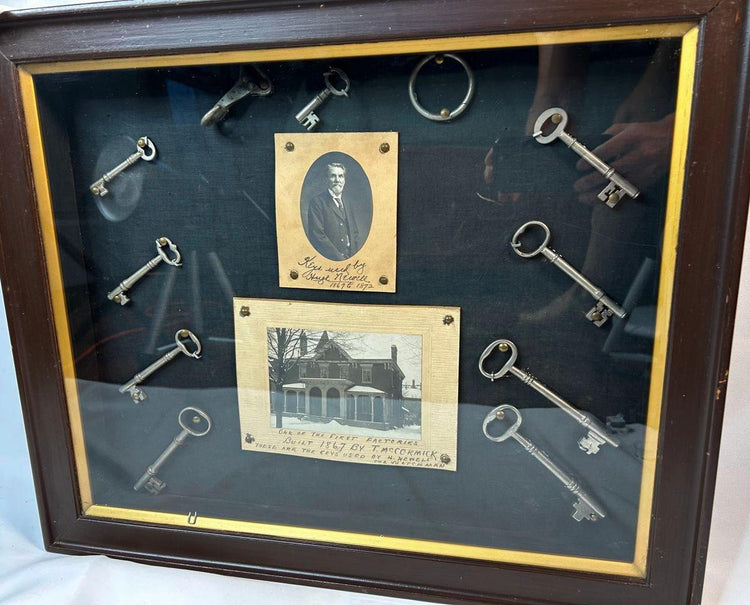 19th-century industrial memorabilia with factory photo and keys